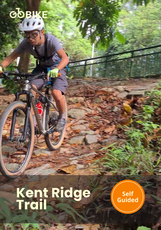 Person riding a bike on the Kent Ridge trail with GoBike.