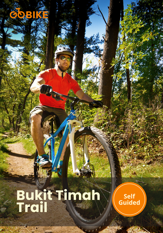 Man riding a bicycle on a trail with 'GoBike' branding and 'Bukit Timah Trail' text.