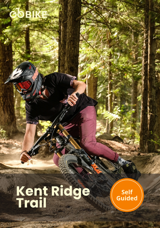 Person riding a mountain bike on the 'Kent Ridge Trail with GoBike.